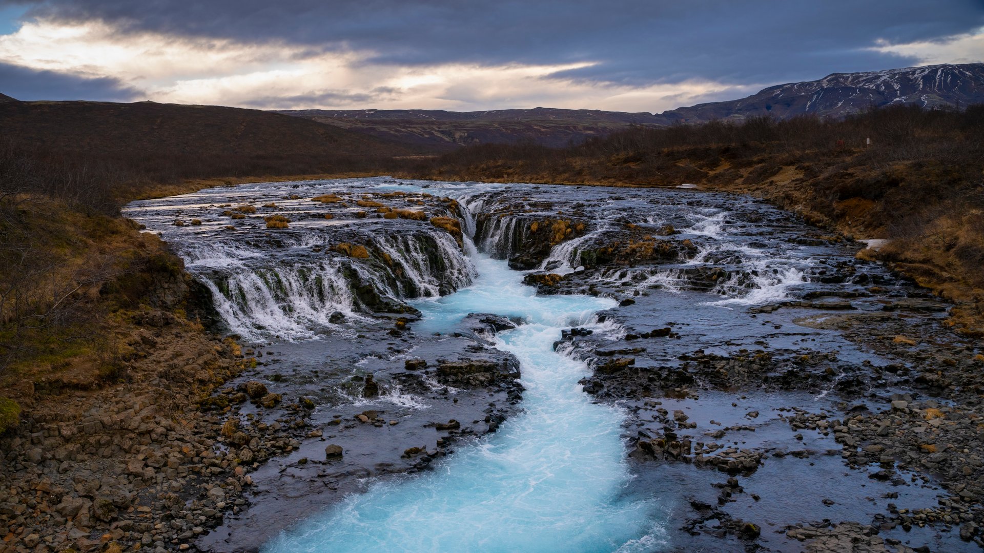 Intense turquoise water of Brúarfoss, Iceland's bluest waterfall