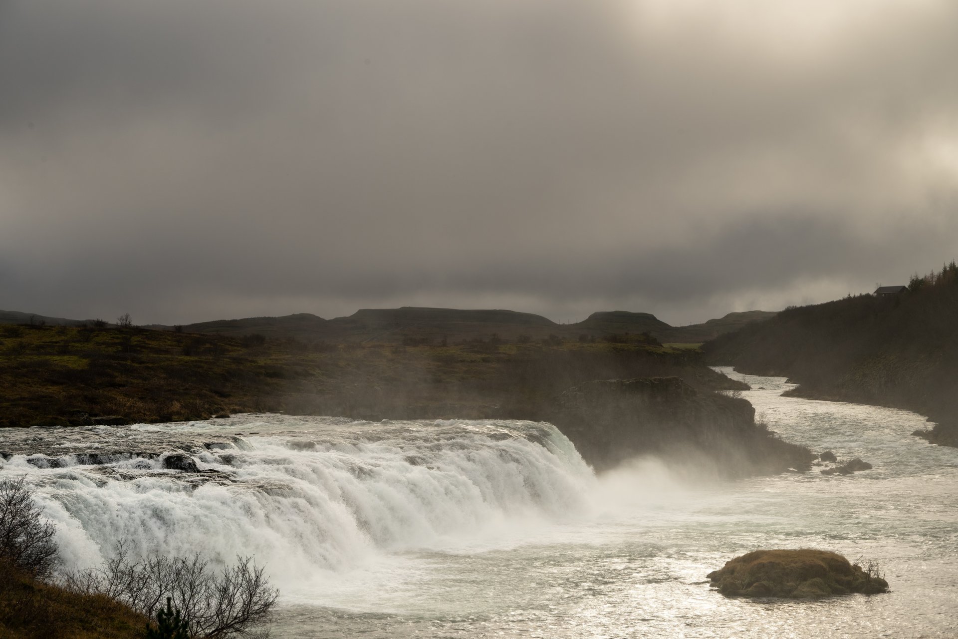 Wide cascade of Faxafoss spreading across basalt ledges