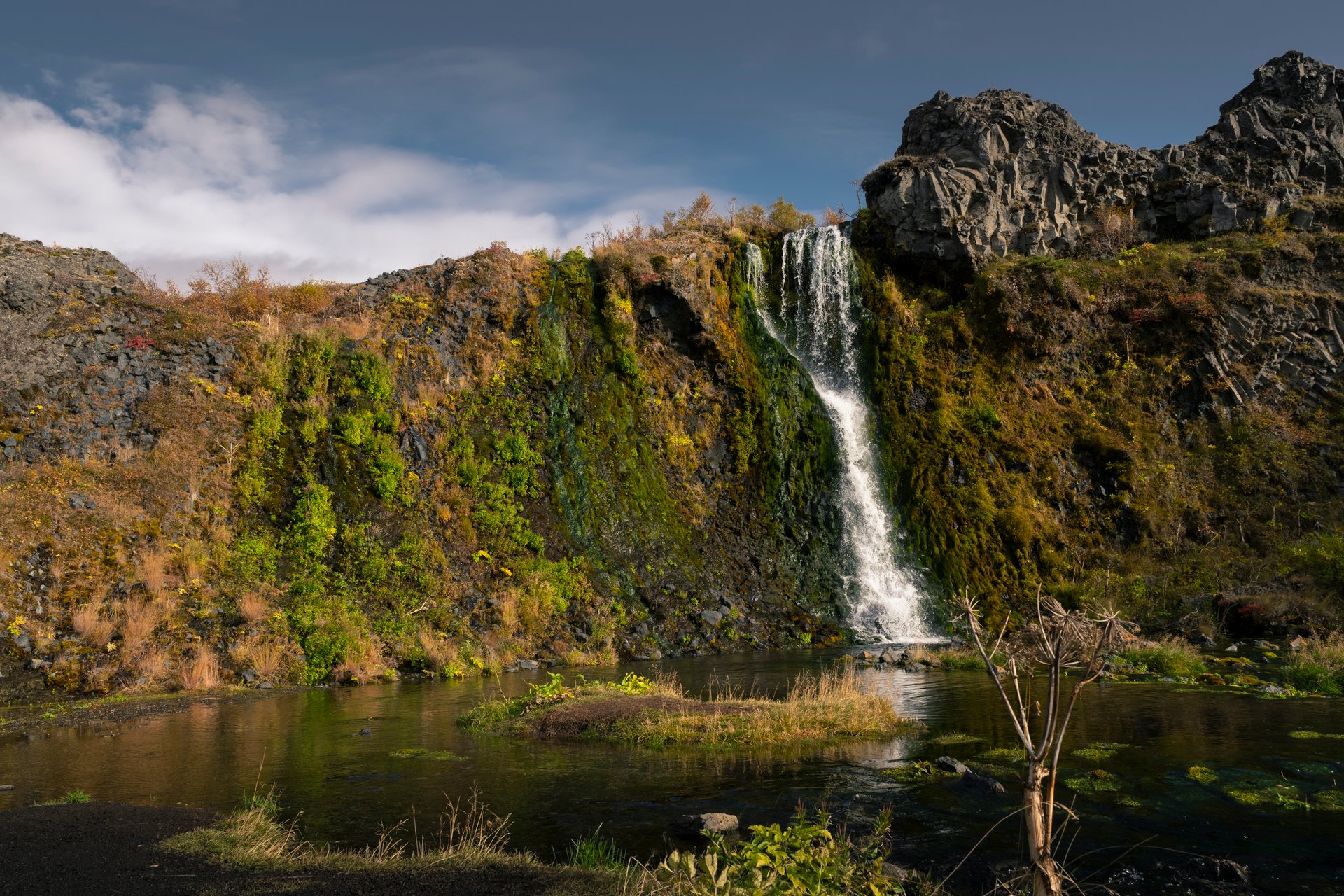 Moss-covered gorge of Gjáin with multiple cascading streams