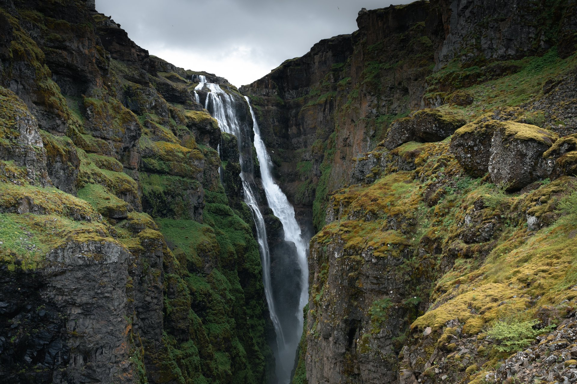 Glymur waterfall dropping 198 meters into the canyon