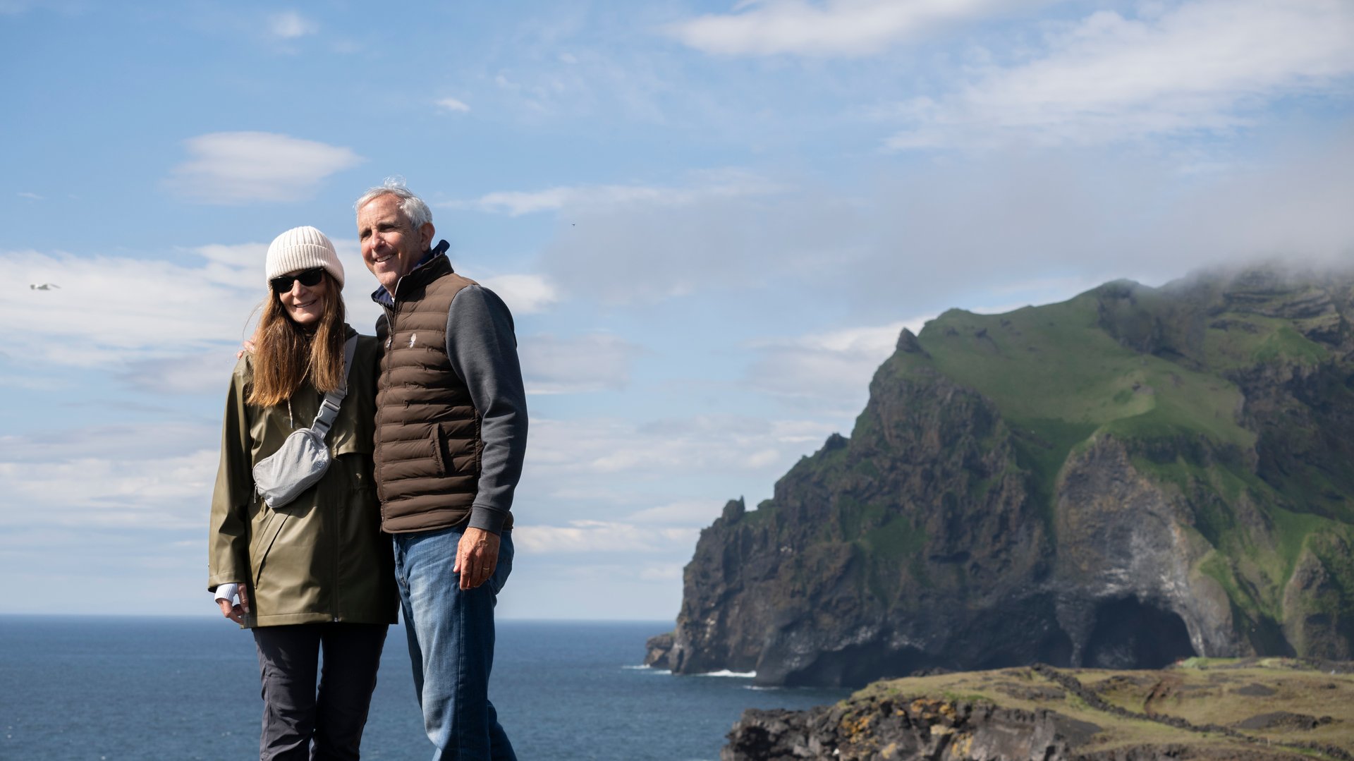 The two couples in front of Elephant Rock in the Westman Islands