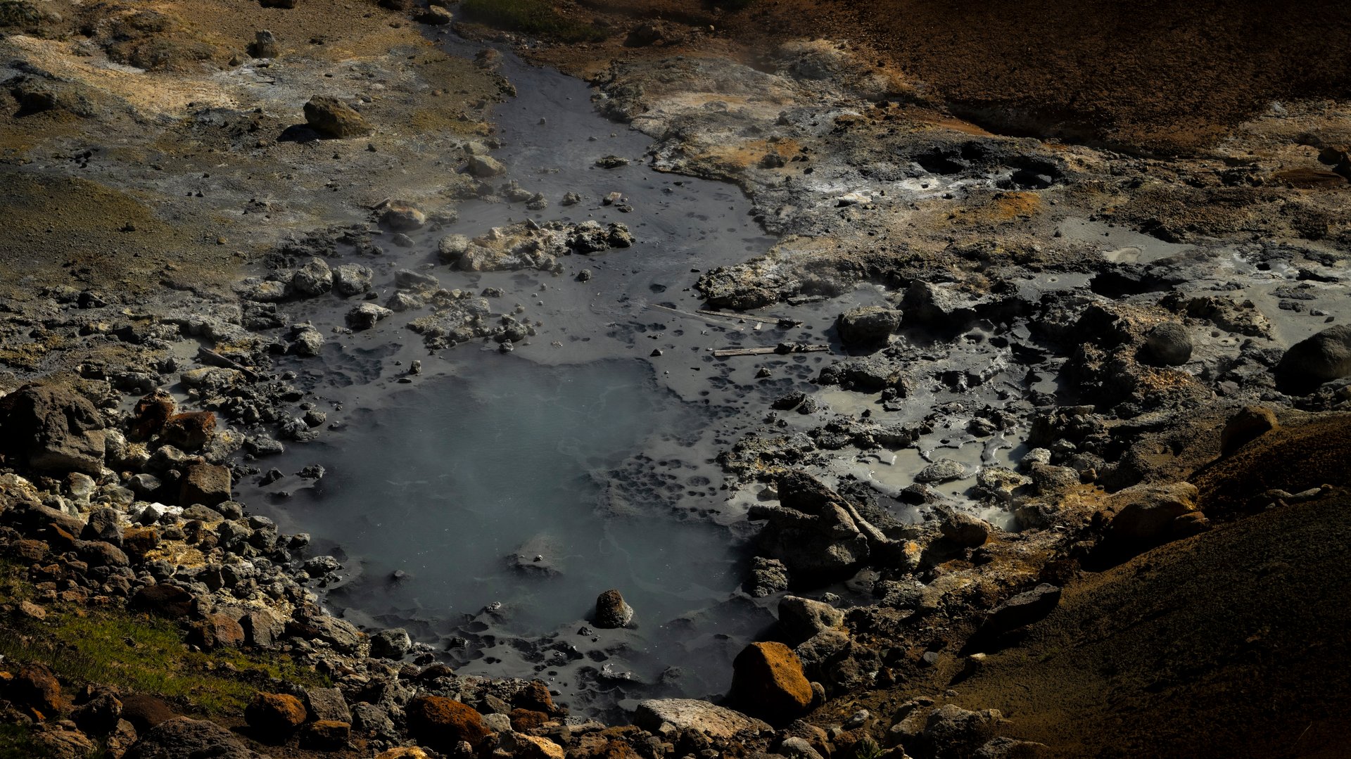 Steaming mud pots and yellow hillsides at Seltún on Reykjanes
