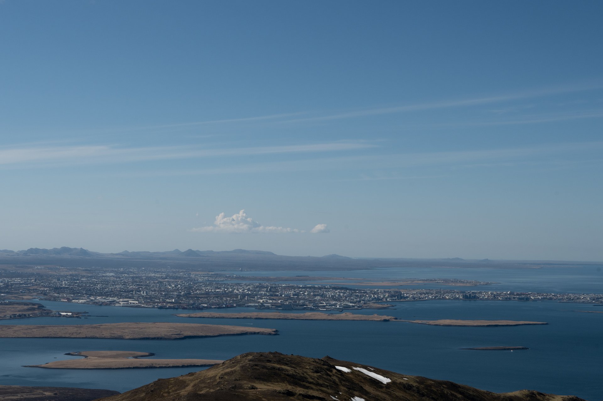 Mount Esja trail winding up through green slopes above Reykjavík