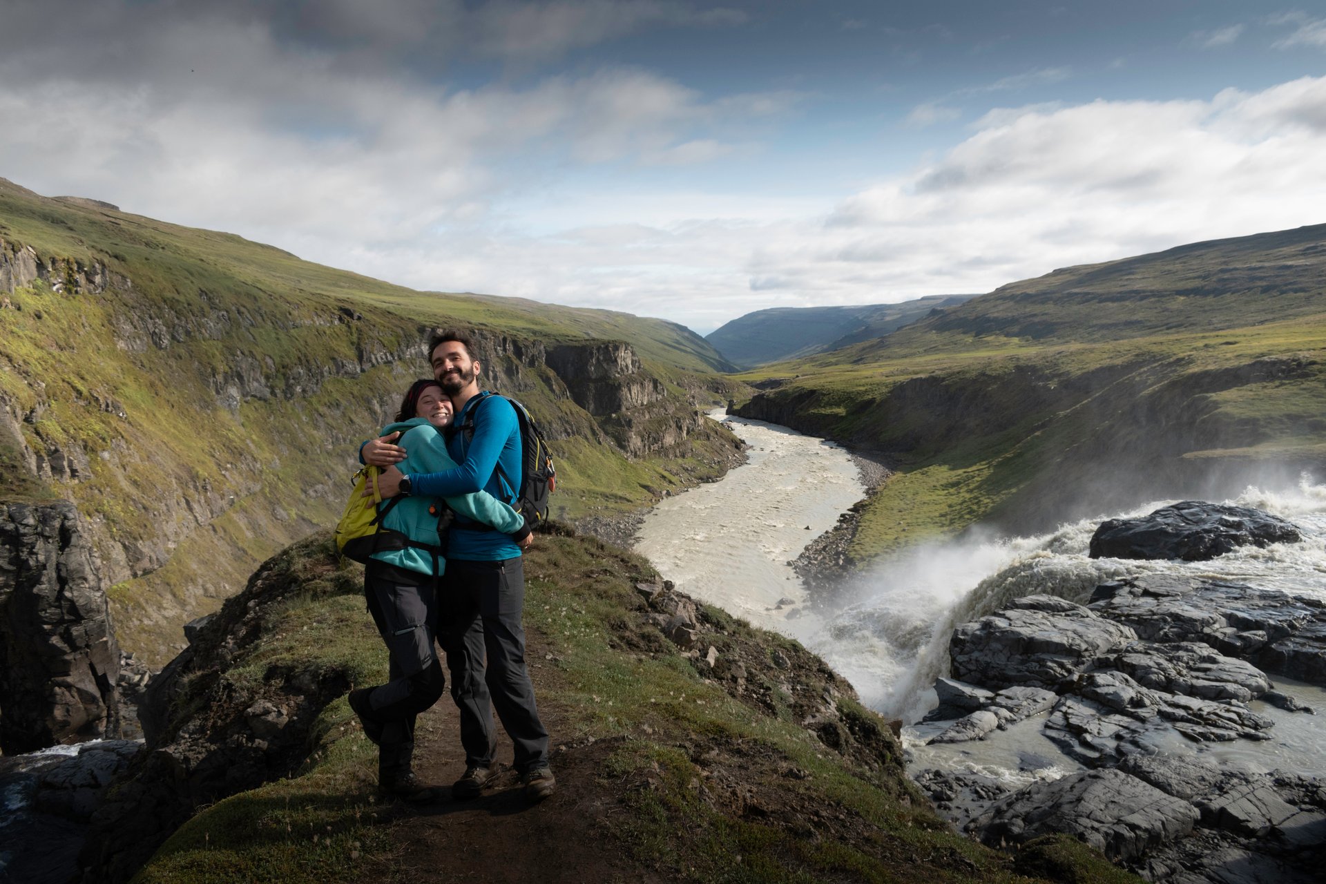 Romantic couple enjoying Iceland honeymoon with dramatic landscape backdrop