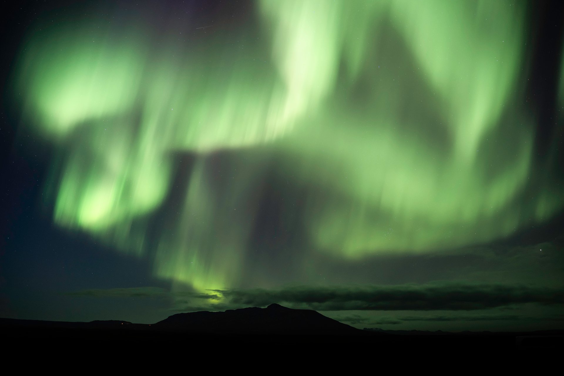 Spectacular aurora display over Iceland mountains