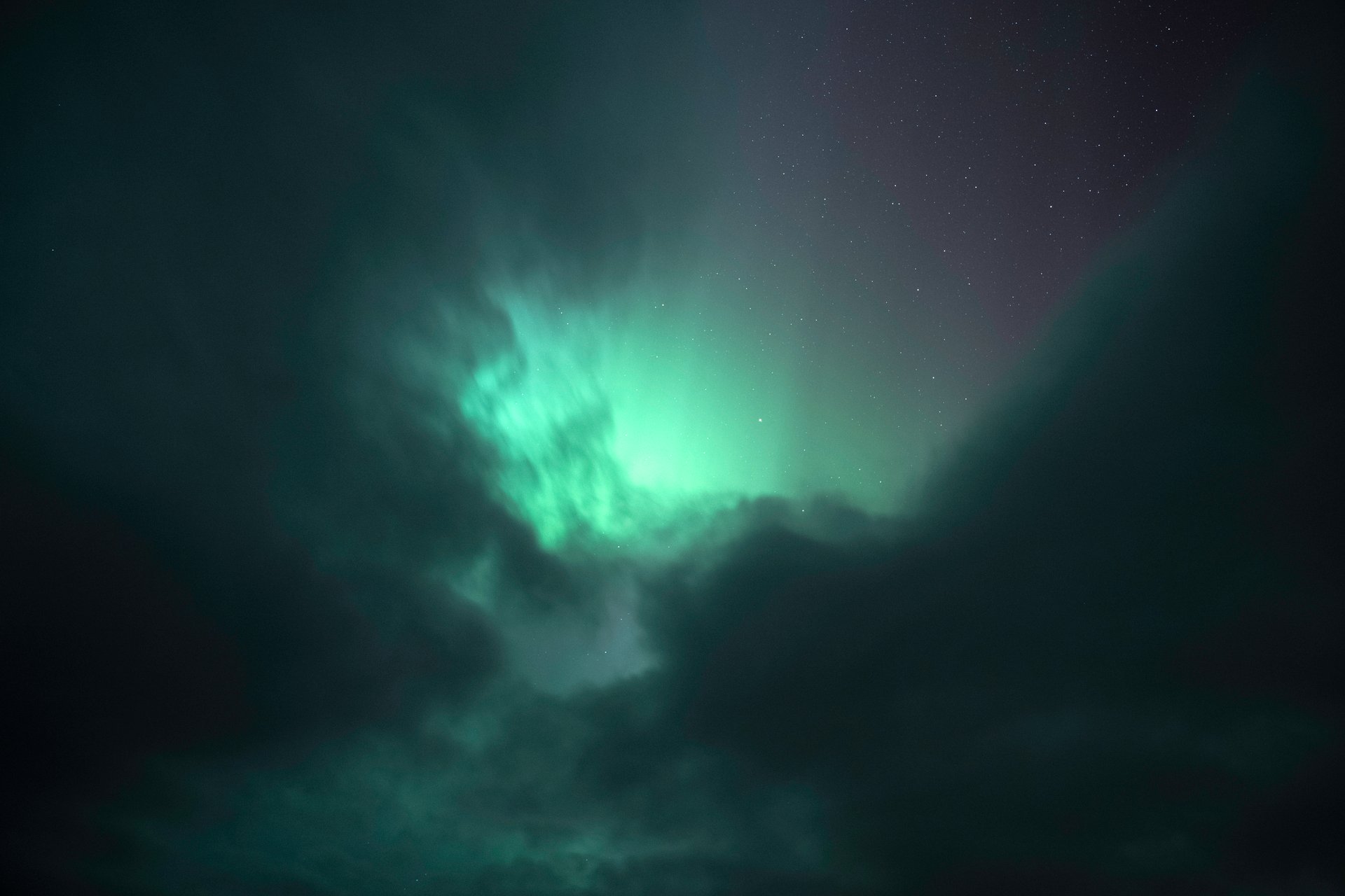 Northern Lights photography showing aurora colors and stars