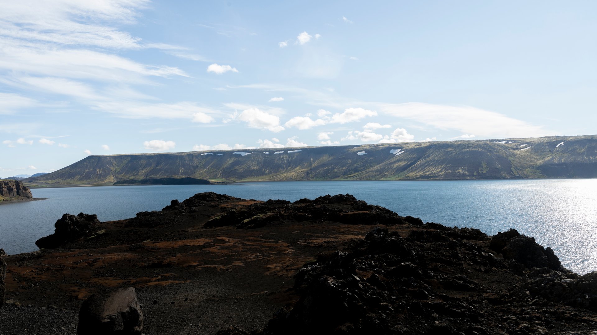 Kleifarvatn deep lake mirror-flat black sand Reykjanes June Iceland