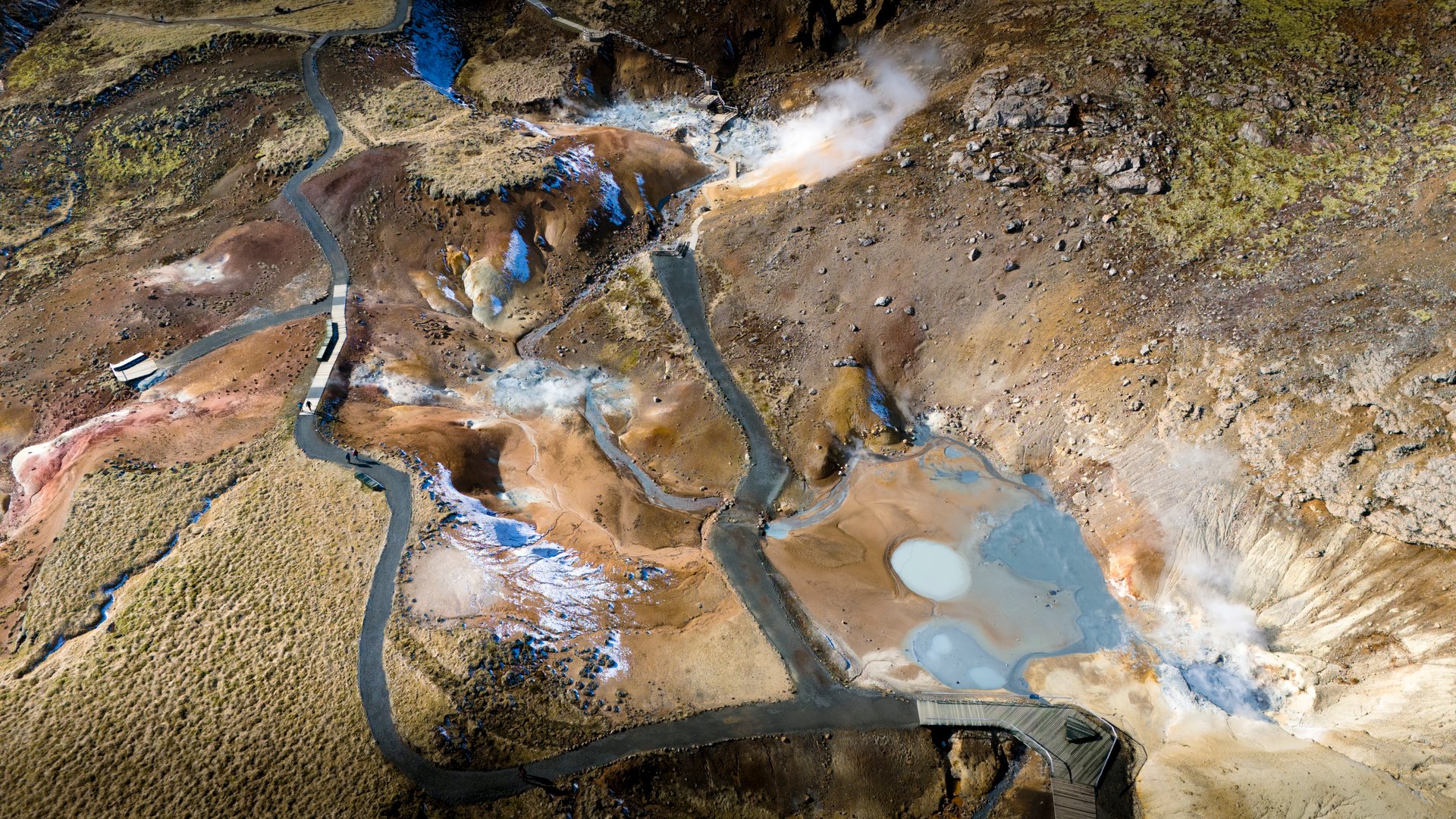 Seltún geothermal area with colorful mud pools Iceland