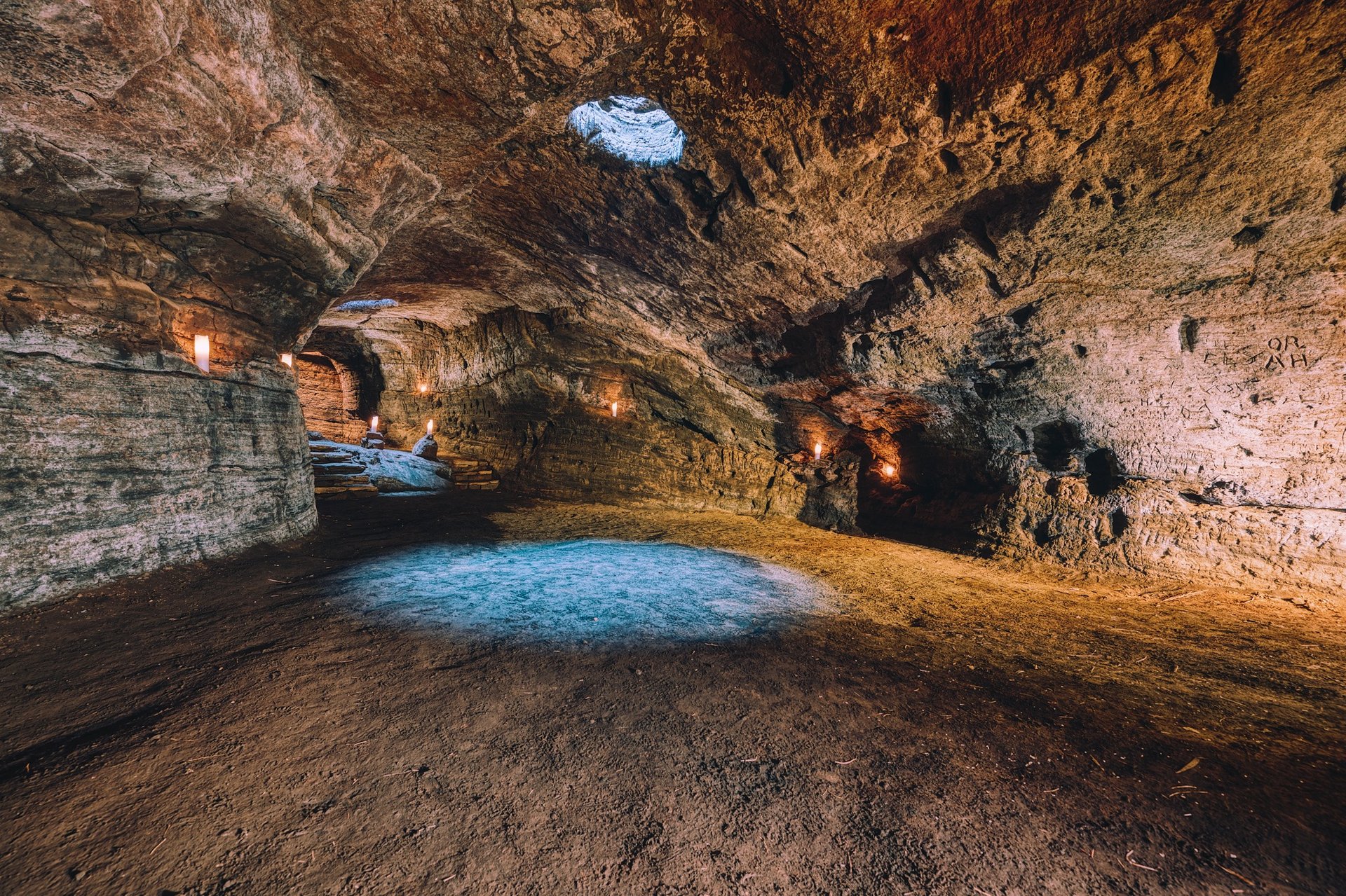Interior of ancient Caves of Hella showing carved stone walls