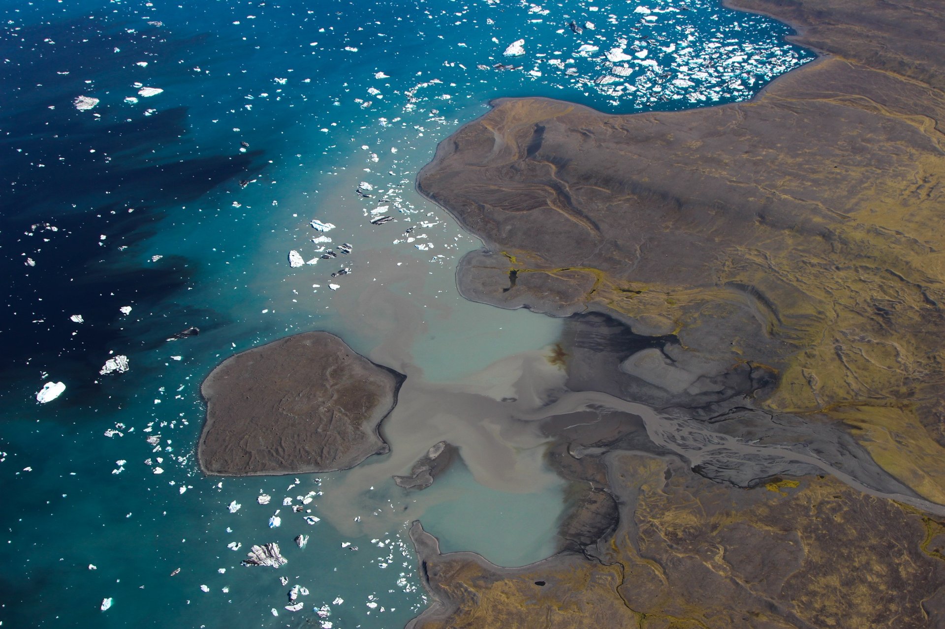 Flying over Vatnajökull glacier crevasses Iceland helicopter tour