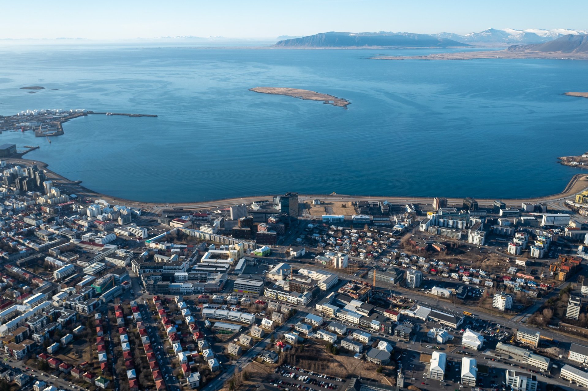 Aerial view of Glymur waterfall cascading down volcanic cliffs