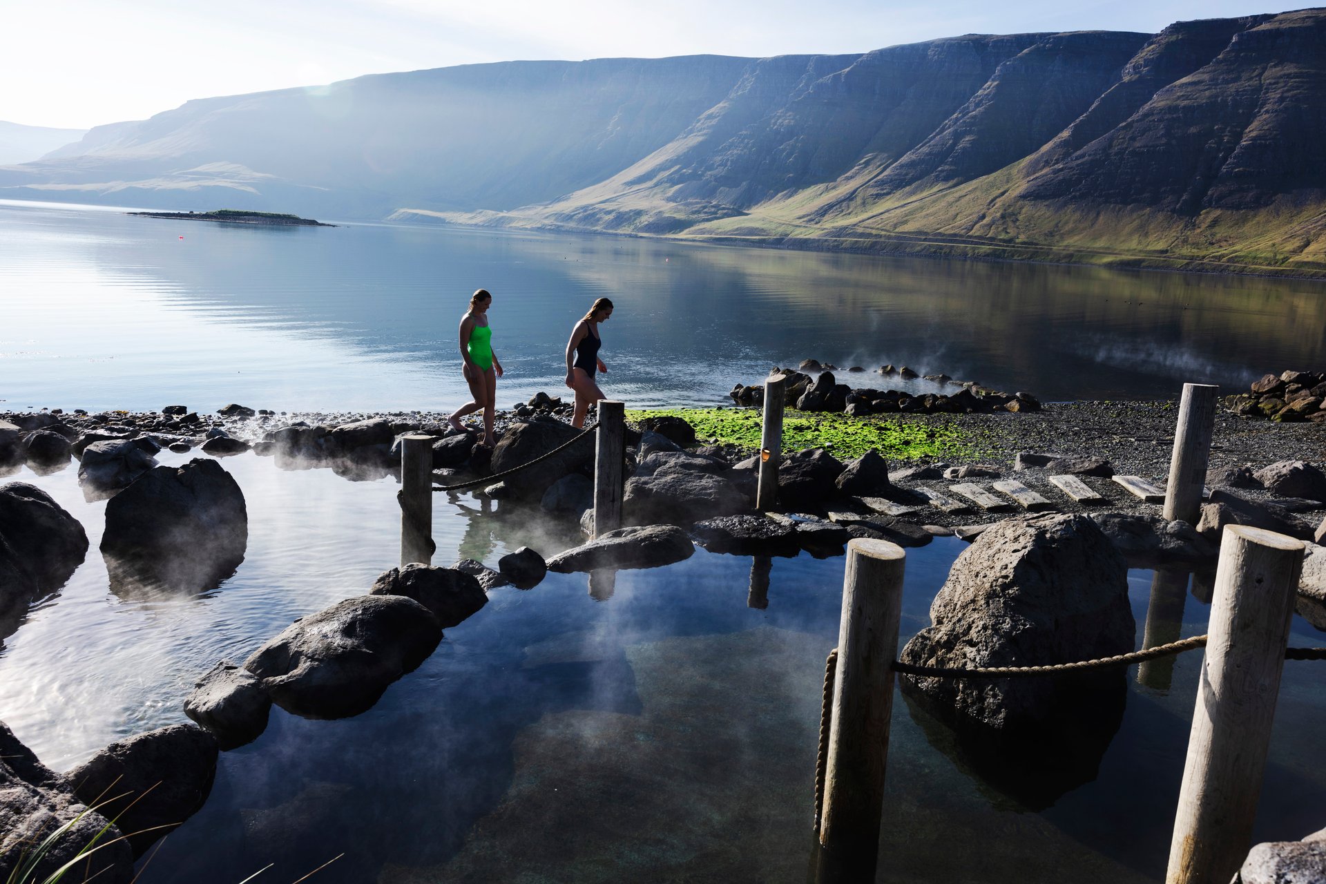 Coastal mountain views from natural hot springs at Hvammsvík