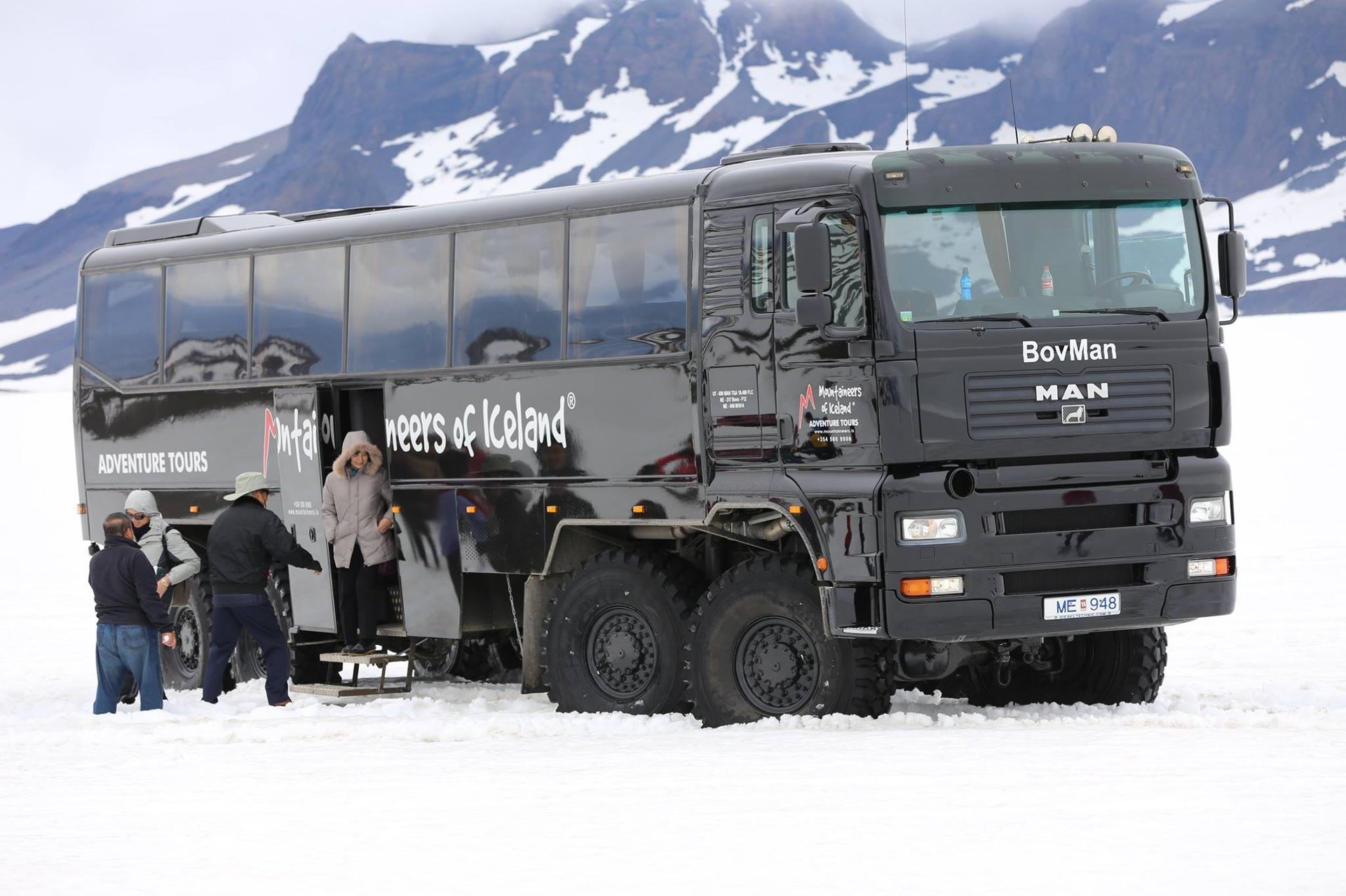 High-speed snowmobile riding across Langjökull glacier Iceland