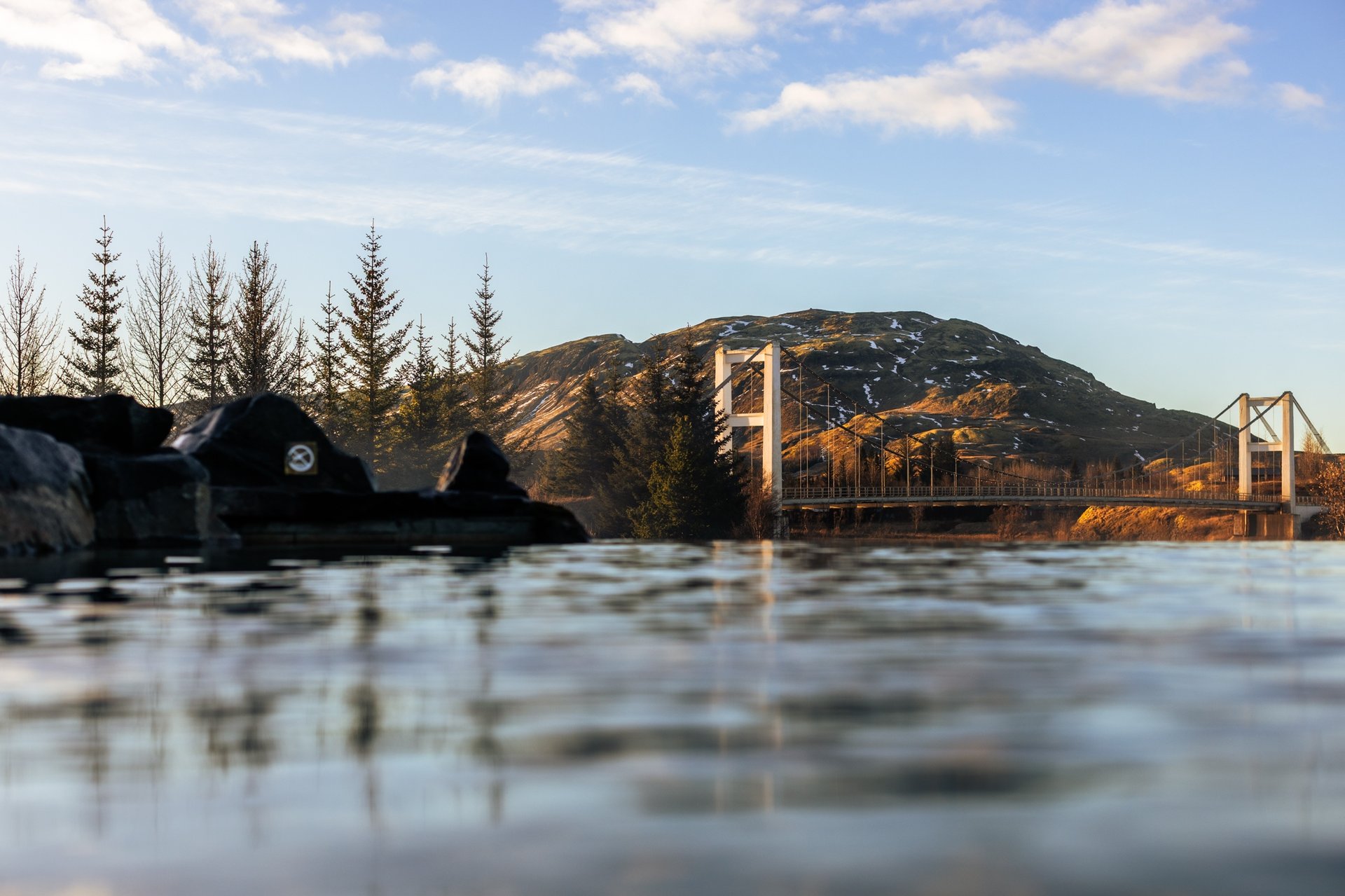 Two-story geothermal lagoon overlooking Hvítá River at Laugarás Iceland