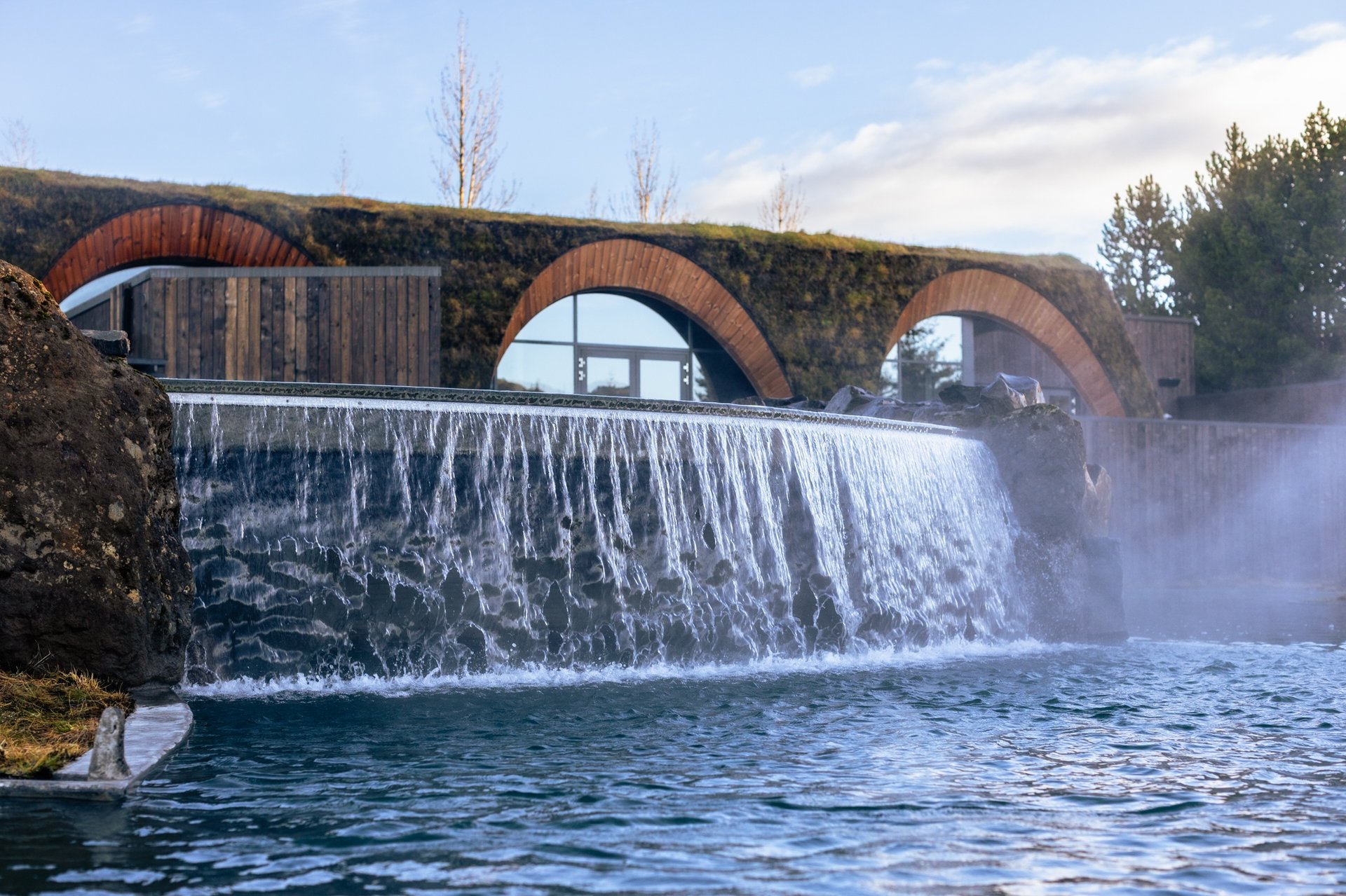 Laugarás Lagoon geothermal pools with mountain views near Golden Circle