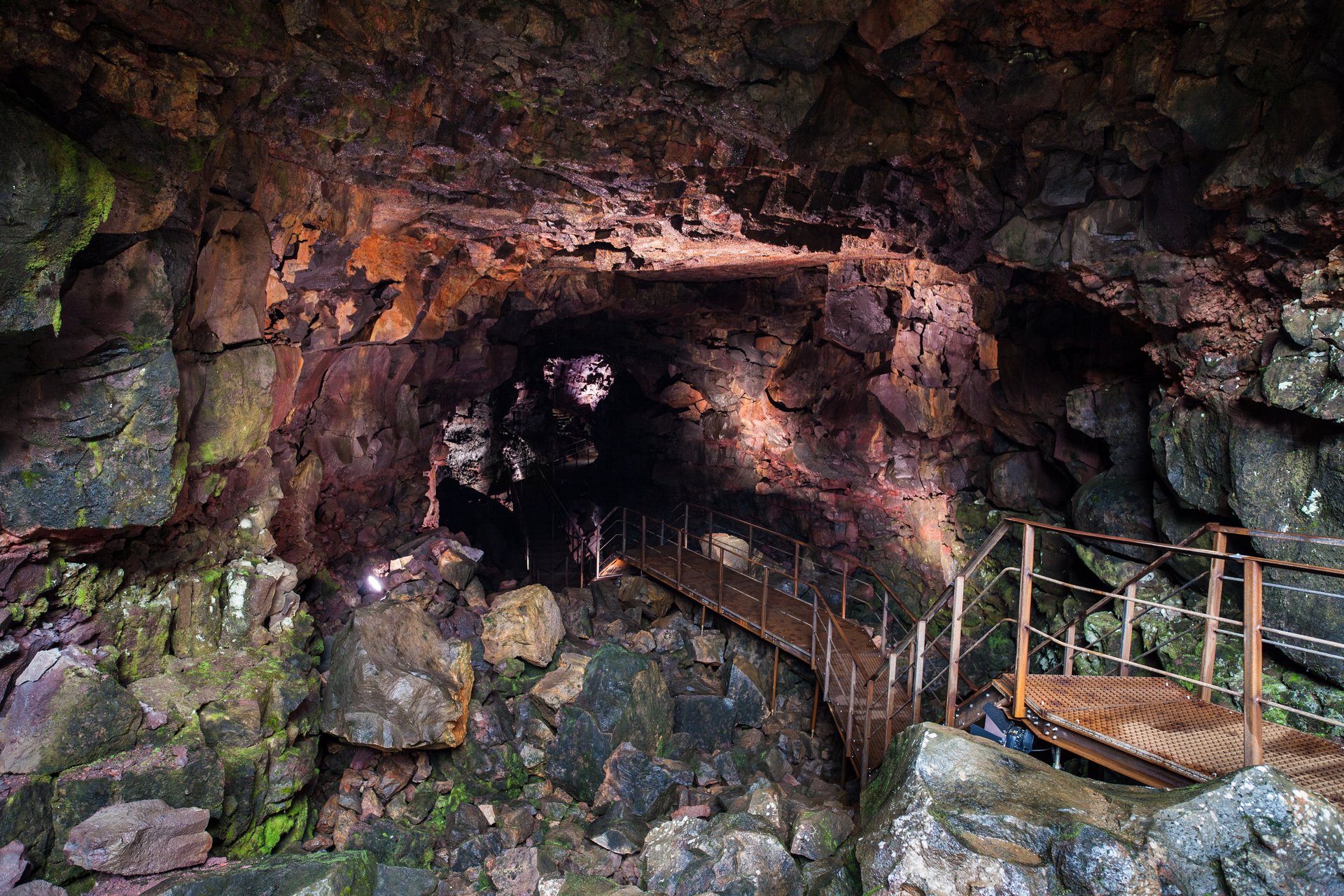 Interior of Raufarhólshellir lava tunnel with dramatic lighting