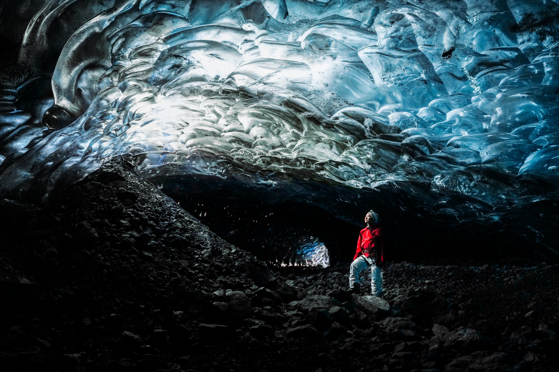 Private early morning ice cave tour inside crystal blue Vatnajökull Glacier Iceland