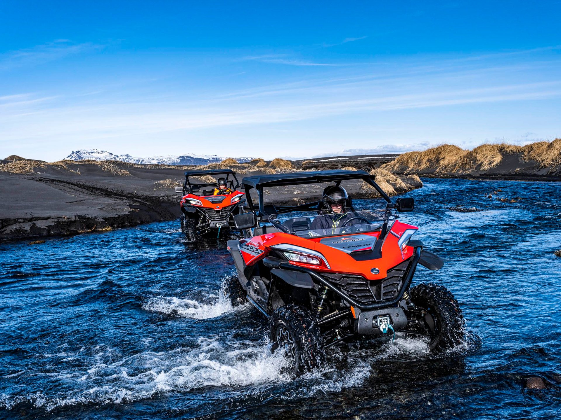 Driving buggy through black sand landscapes in Þakgil canyon
