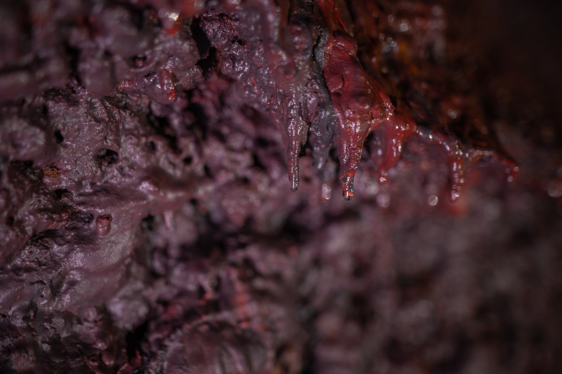 Professional cave lighting revealing ancient lava tube structures