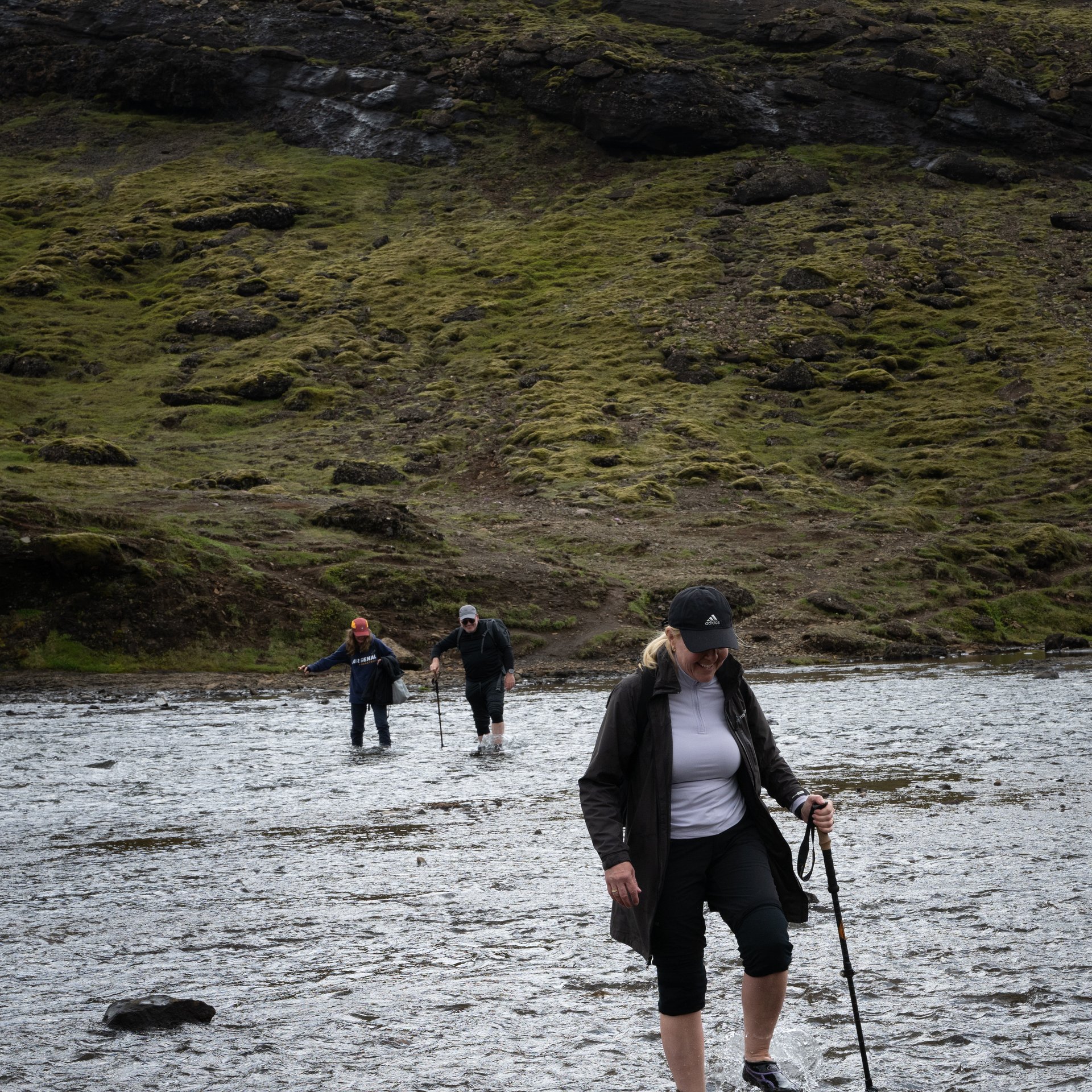 Private hiking guide leading group through Glymur canyon terrain