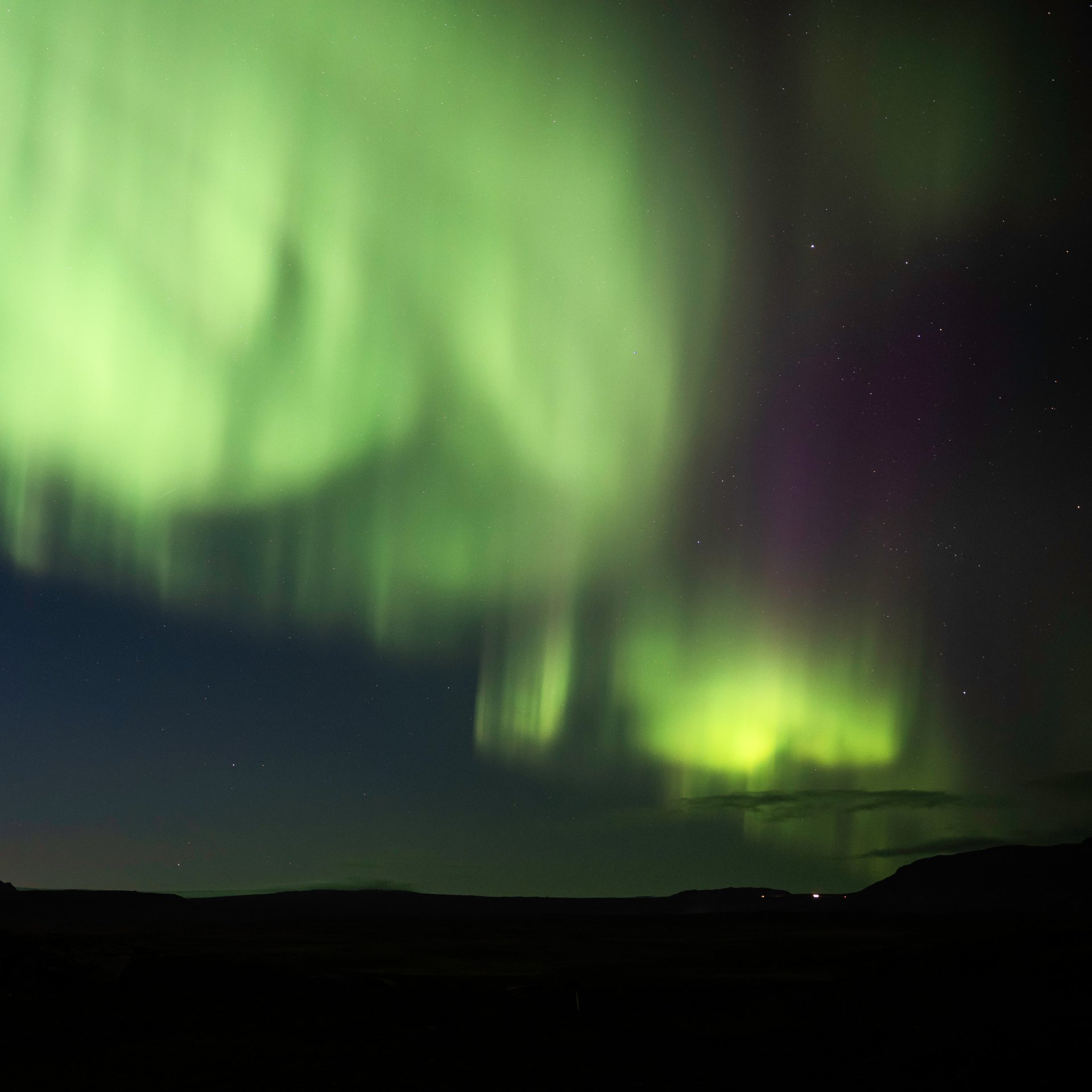 Vibrant green Northern Lights aurora display