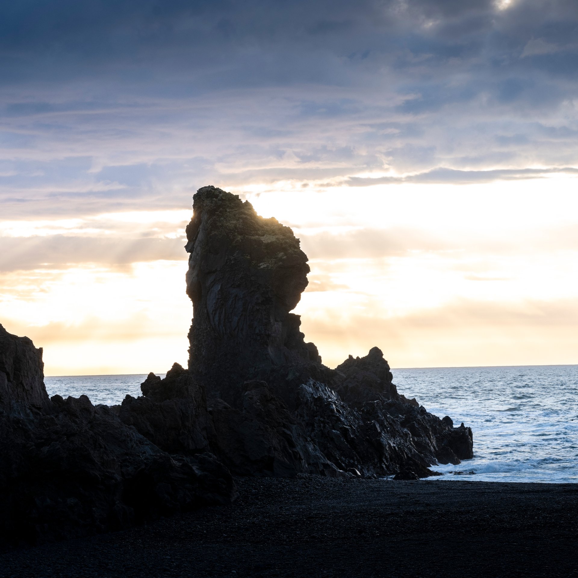 Búðakirkja black church against golden grass and lava fields