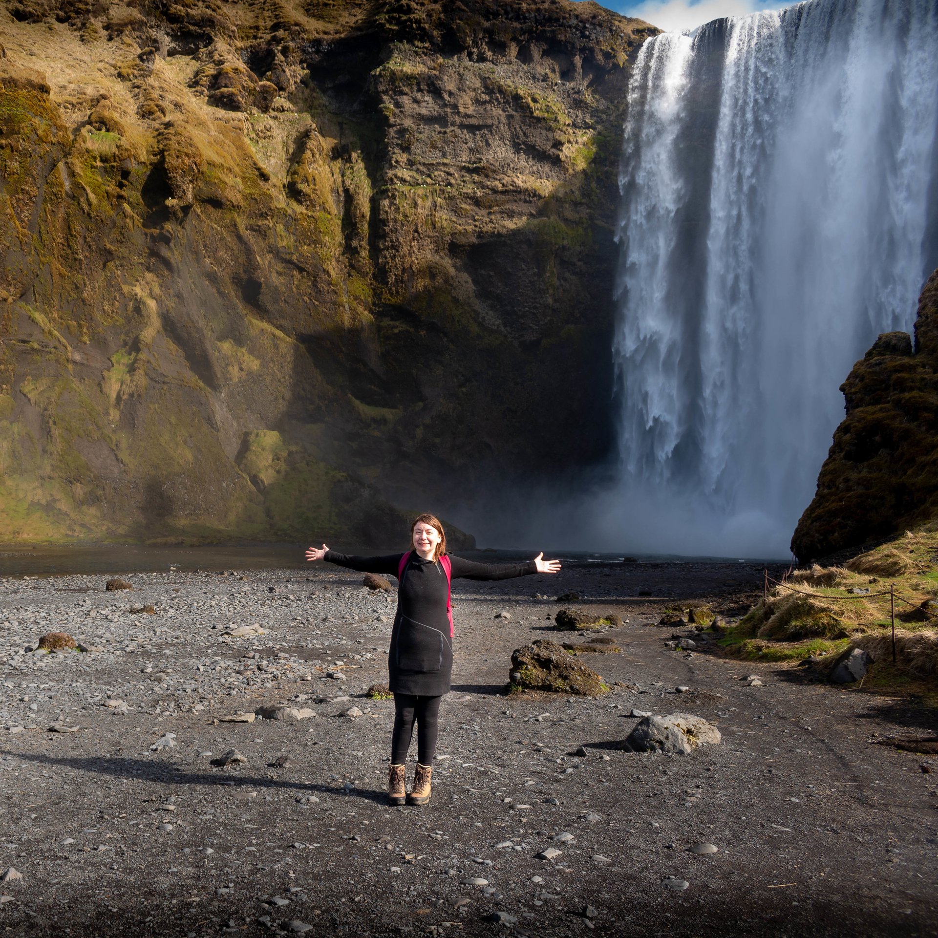 Iceland south coast natural arch and sea cliffs