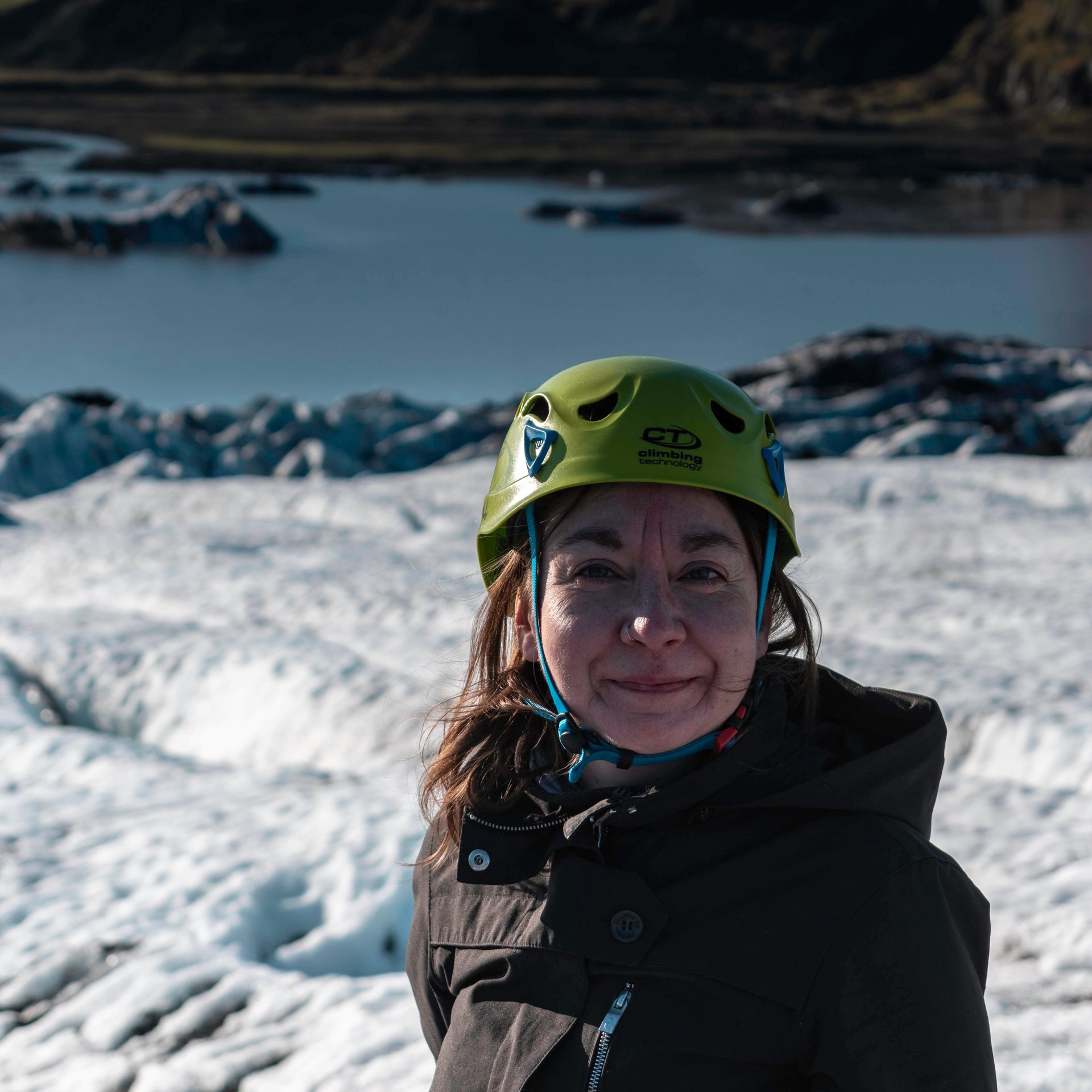 Adventurers standing on ice looking into distance