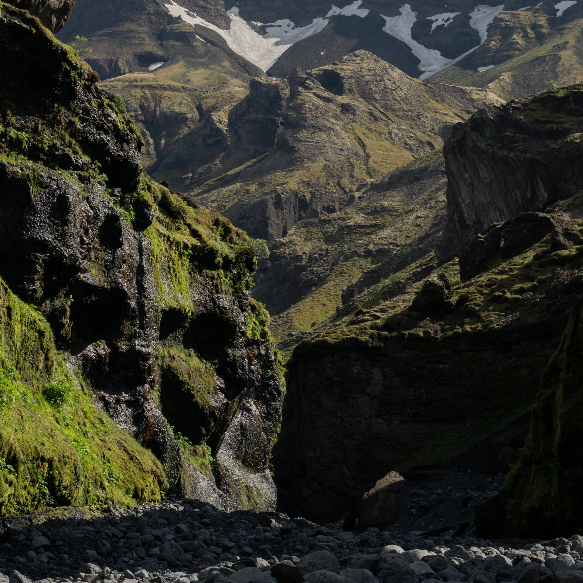 Stakkholtsgjá canyon with towering cliffs and hidden waterfall