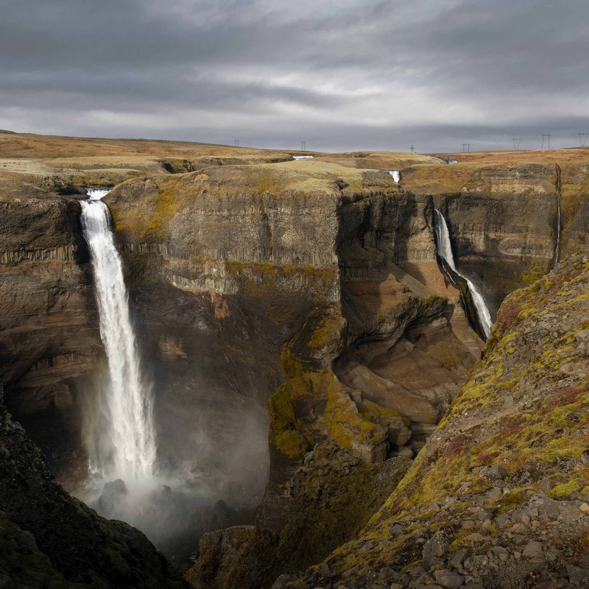Highland terrain and volcanic landscape surrounding cultural sites