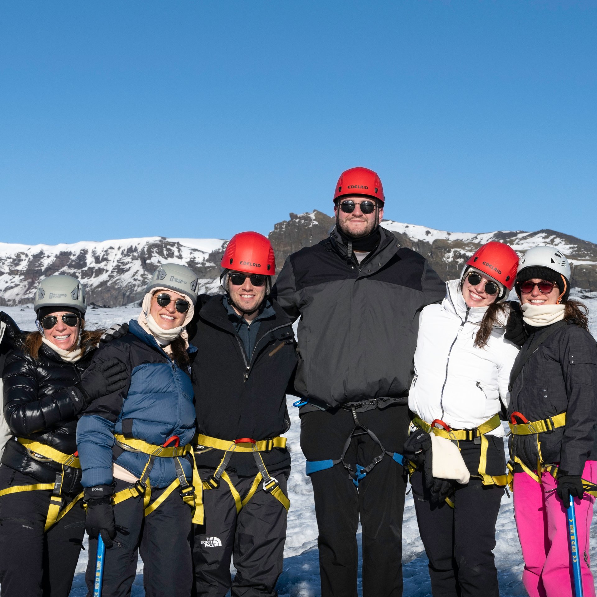 Sólheimajökull glacier hiking adventure with crampons on blue ice formations