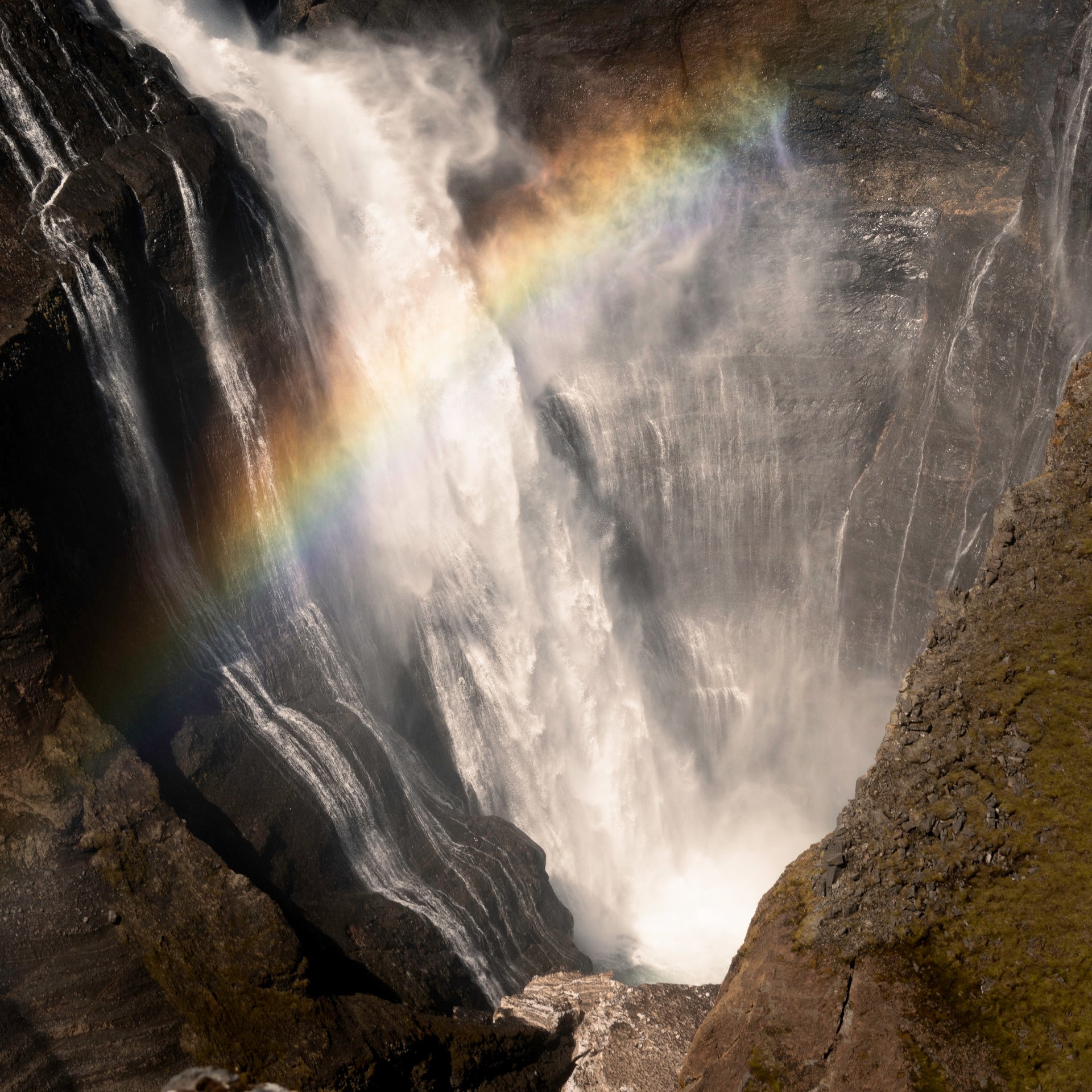 Spectacular 122-meter Háifoss waterfall cascading into deep volcanic canyon with Granni falls