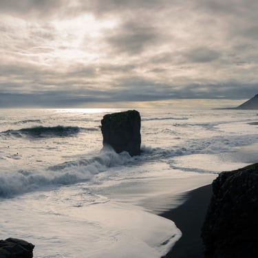 Reynisfjara black sand beach basalt columns and sea stacks