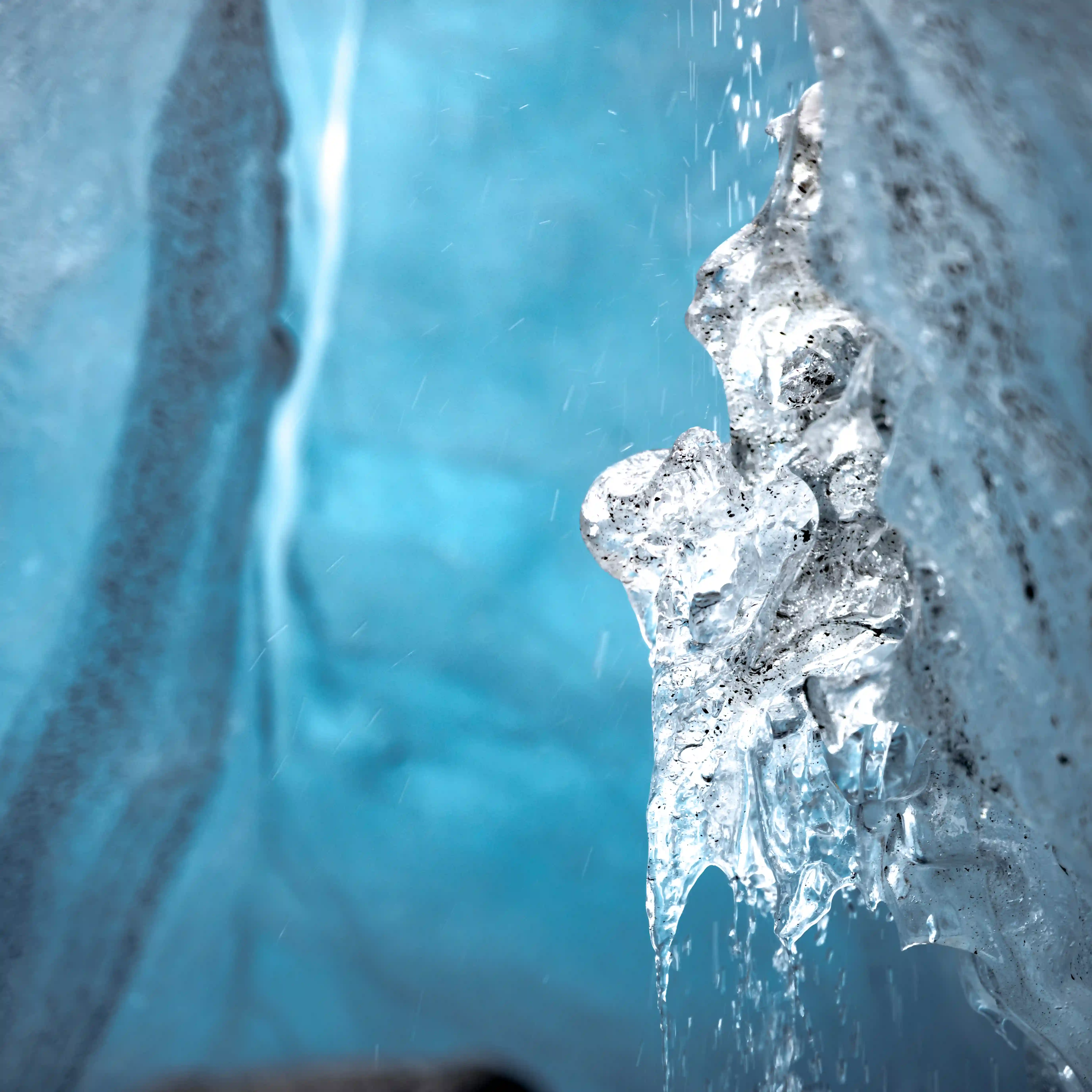 Natural ice cave with ethereal blue crystal formations inside Vatnajökull glacier