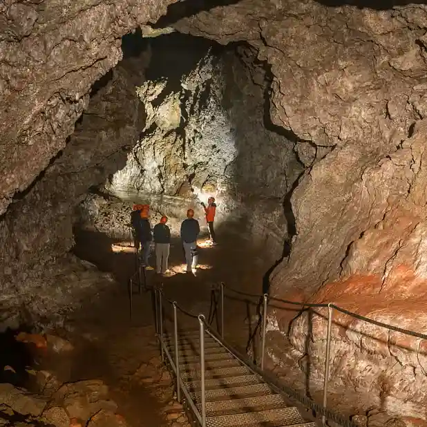 Underground lava tunnel at Vatnshellir cave with ancient volcanic rock formations