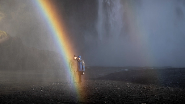 Read our blog article Couple on a private tour in Iceland before a waterfall
