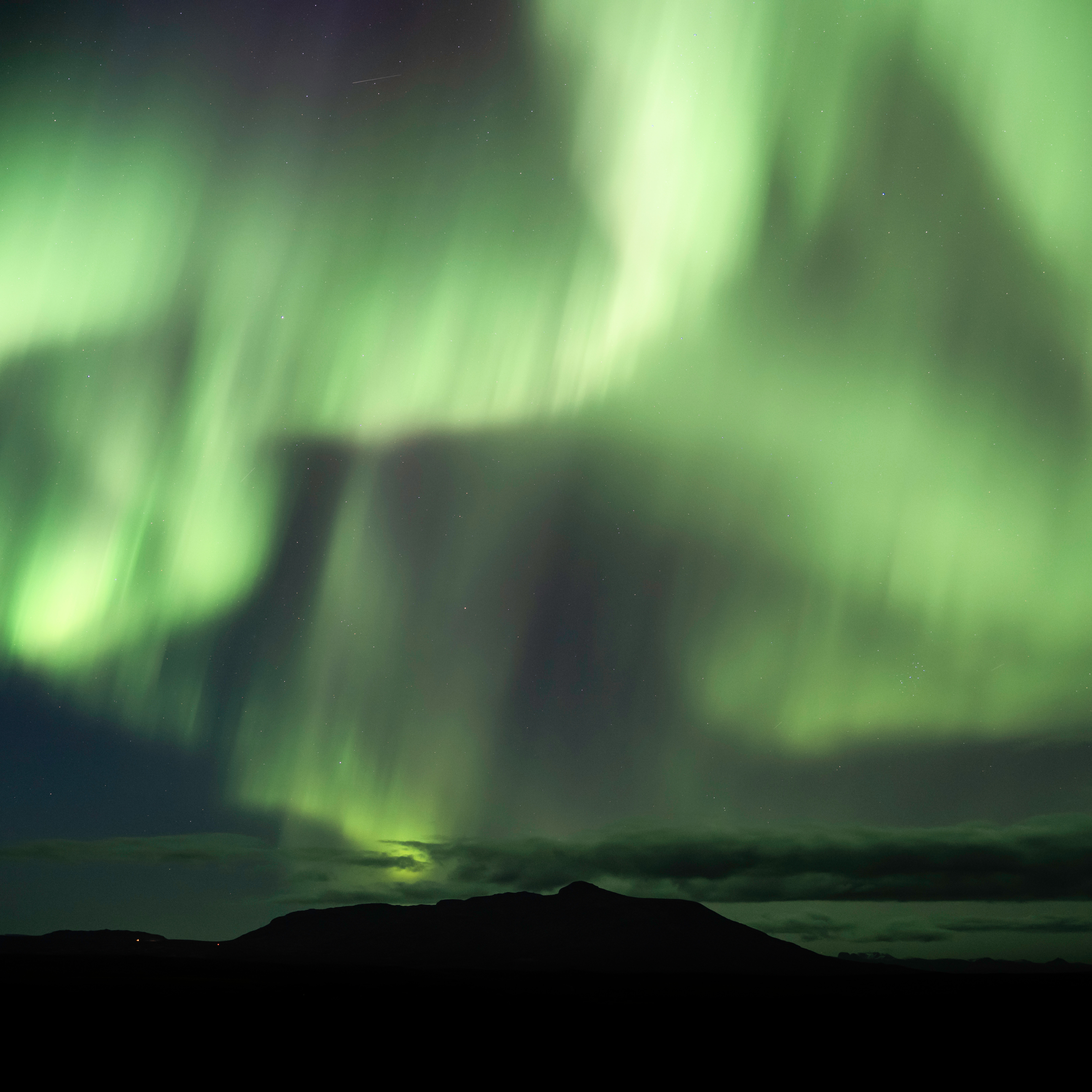 Setting up for aurora photography during a private Northern Lights hunt