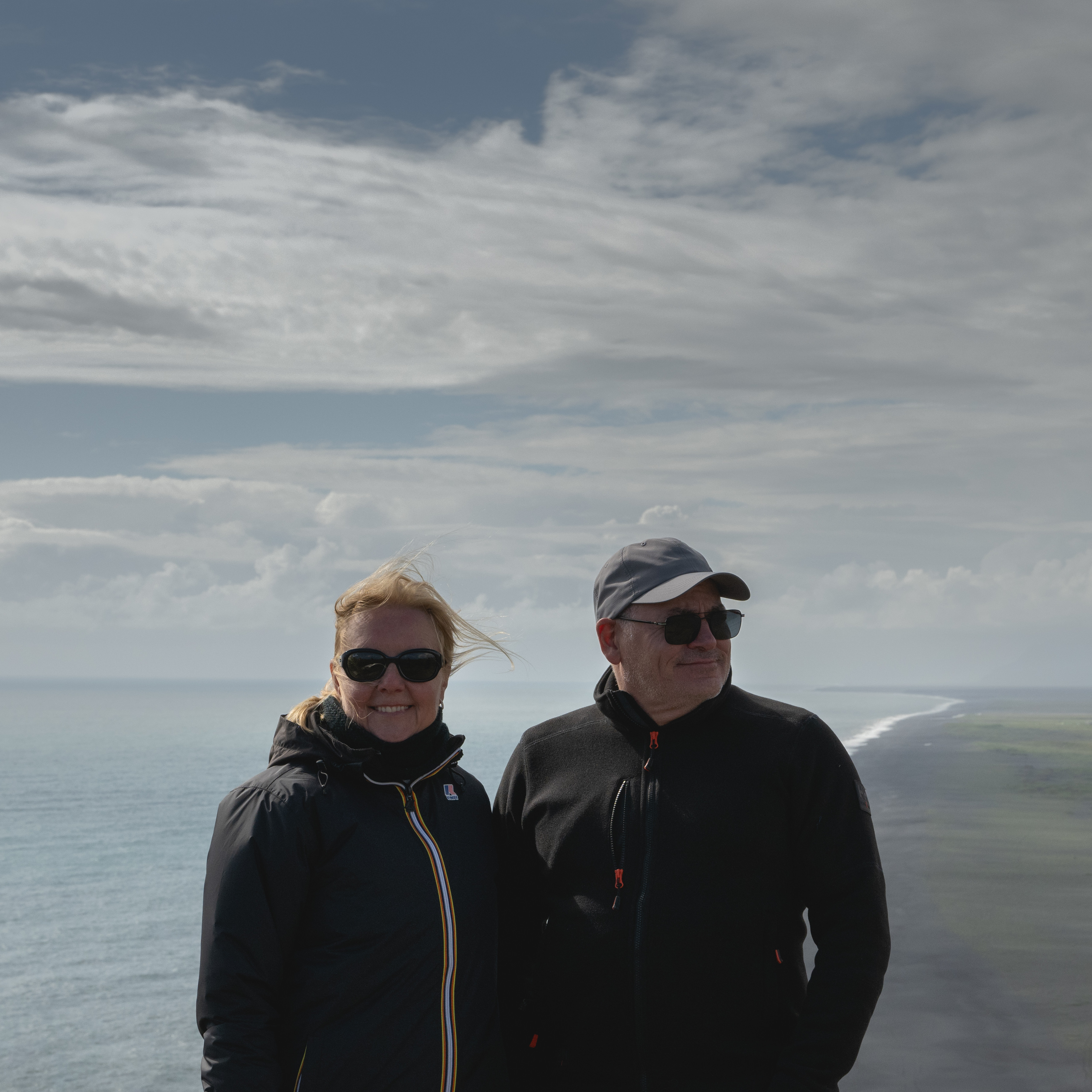Walking behind the cascading waters of Seljalandsfoss on the South Coast